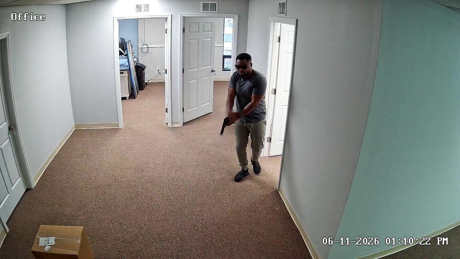 Office camera where MDI Aegis flags a person carrying a handgun